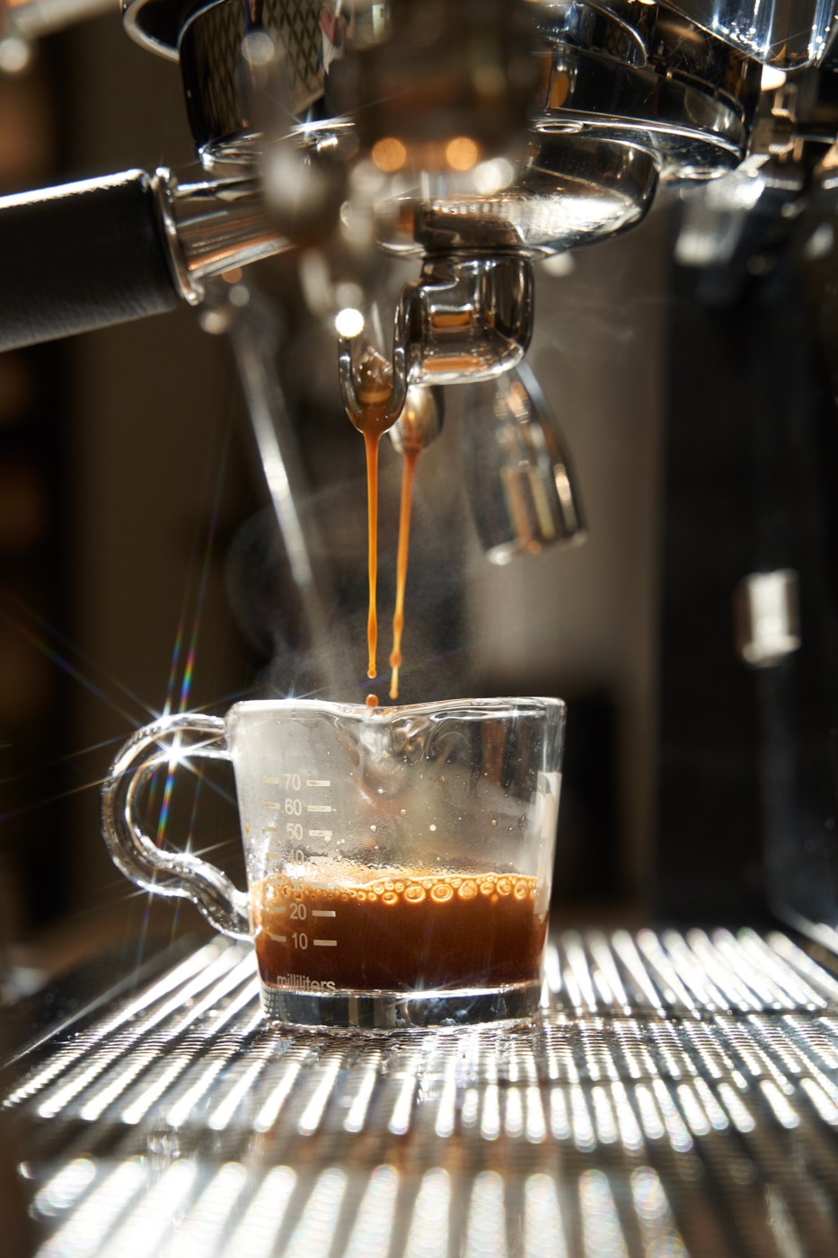 Espresso extracting from the machine